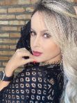 Brazilian blonde 34F bust size escort girl