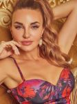 blonde 34C bust size escort girl, 5`7" tall, Russian