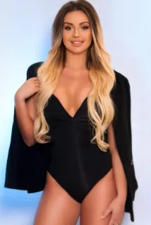 Caprice escort - 36C bust, blonde hair, brown eyes