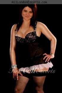 Tania escort - 34D bust, Black hair, Brown eyes