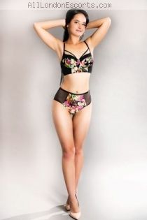 Ginger escort - 32B bust, Brunette hair, - select - eyes