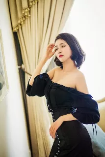 Tam escort - 34B bust, black hair, black eyes
