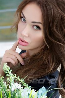 Mila escort - 34C bust, brunette hair, blue eyes