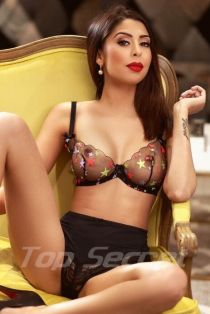 Carmelita escort - 32B bust, brunette hair, blue eyes