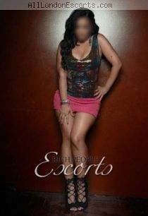 Bina escort - 34D bust, black hair, brown eyes