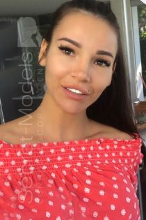 Ketty escort - 34C bust, brunette hair, blue eyes
