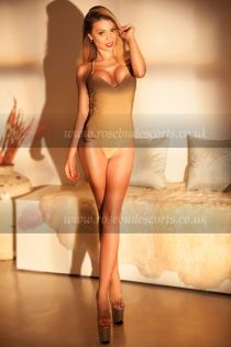 Jordan escort - 34B bust, blonde hair, brown eyes