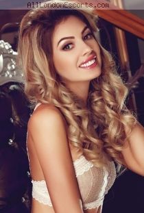 Xenia escort - 32B bust, blonde hair, brown eyes