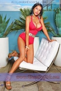 busty escort Caprice
