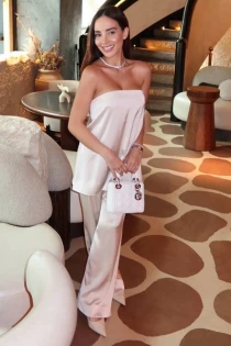 striptease escort Denella